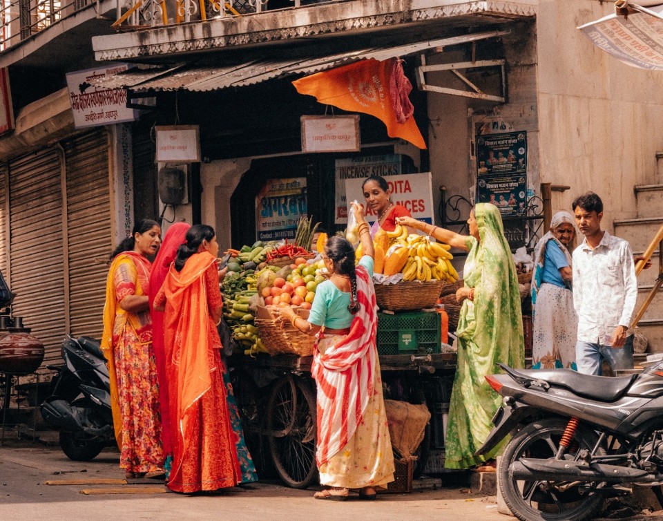 Women in Udaipur dressed in traditional outfits. 
