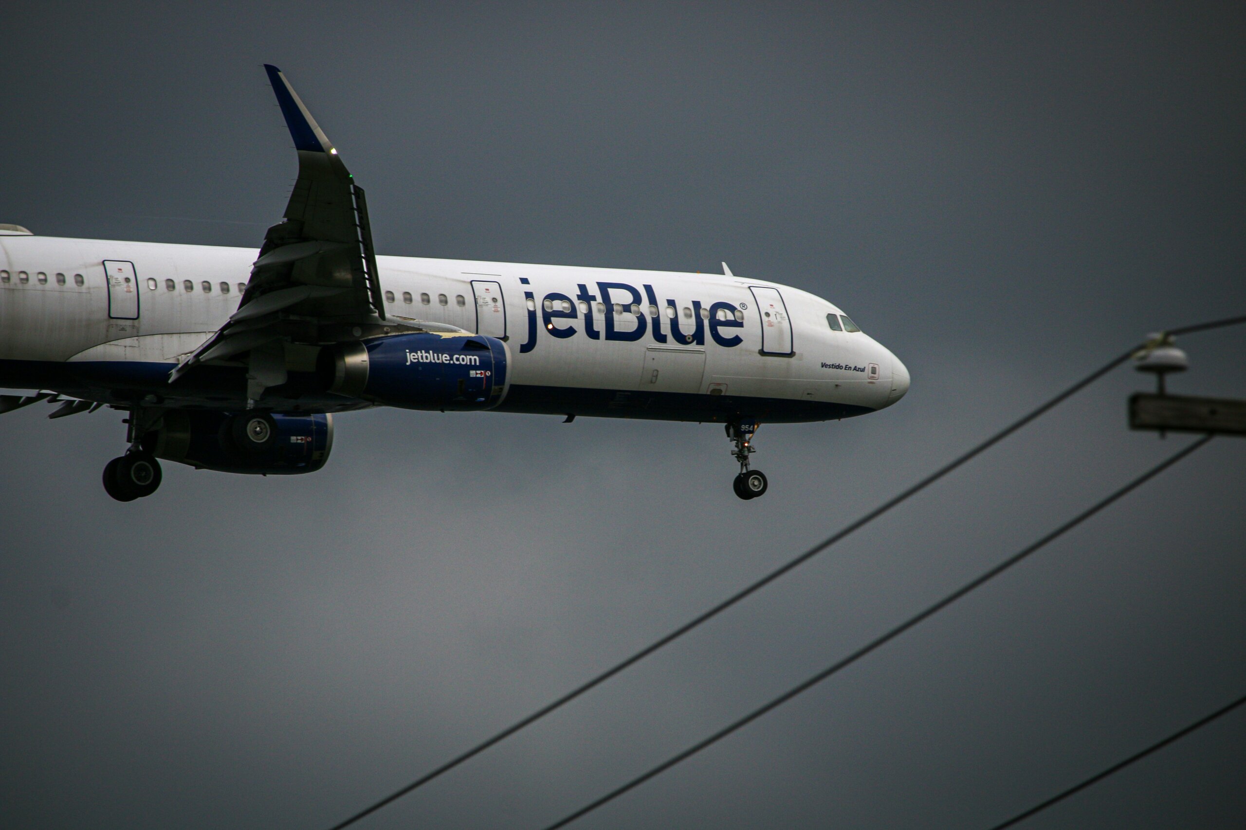JetBlue airplane mid-flight, representing airlines known for better seat spacing to help travelers feel less crowded on a plane.