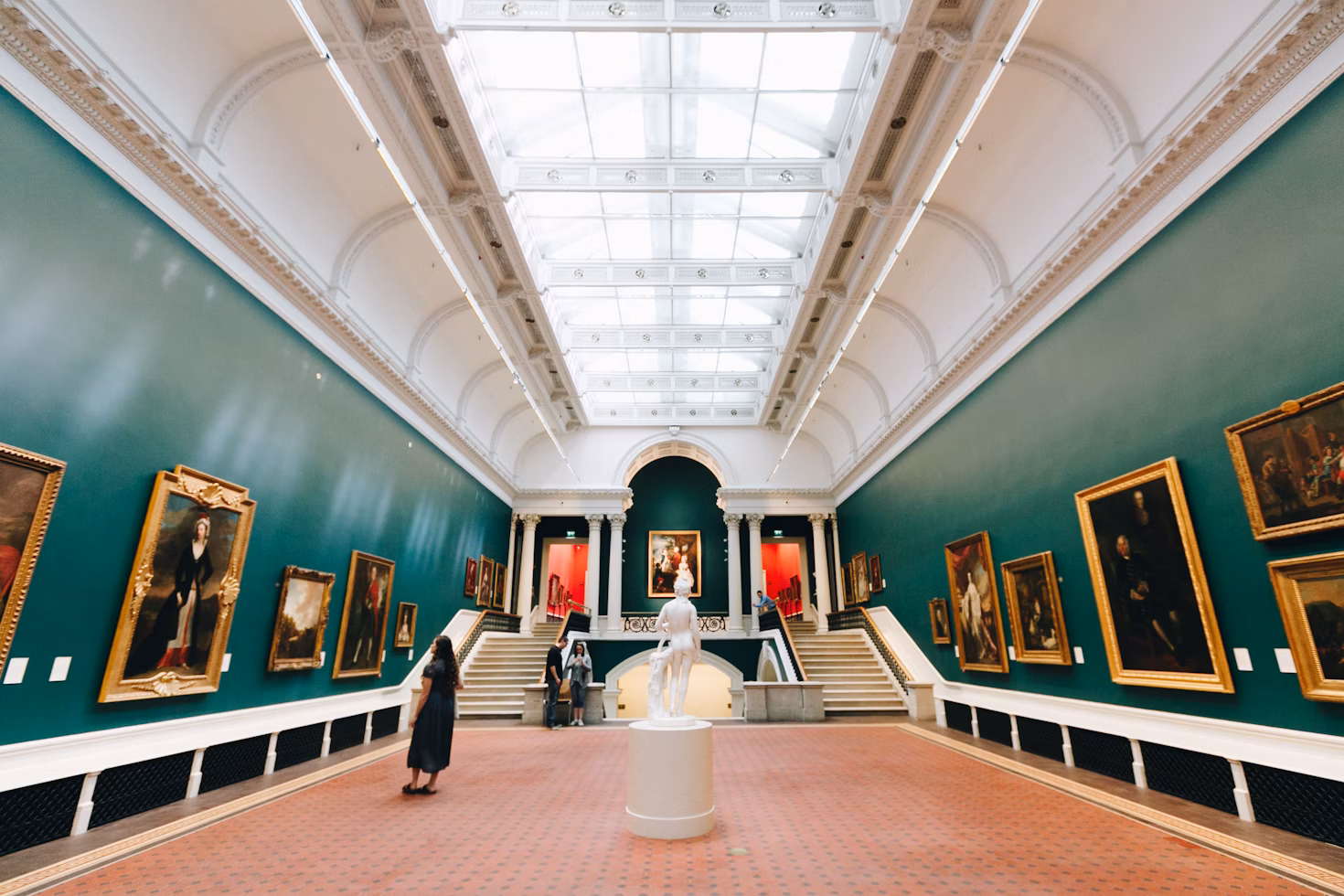 people sitting on chair inside the National Gallery of Ireland
