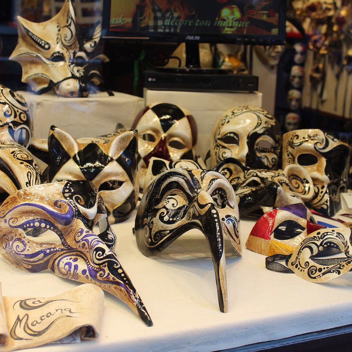 Handcrafted Venetian masks displayed at Ca’ Macana workshop in Dorsoduro, Venice.
