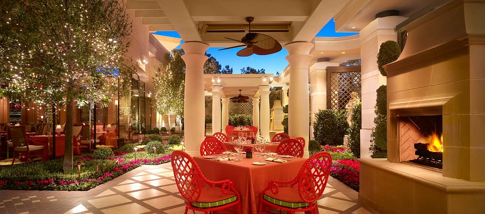 Romantic courtyard at Sinatra in the Wynn, an exclusive Las Vegas dining experience celebrating Frank Sinatra’s Italian favorites.