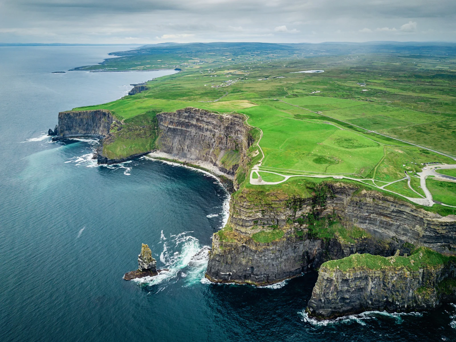 Cliffs of Moher on Ireland’s Wild Atlantic Way — a scenic retirement bucket list destination.