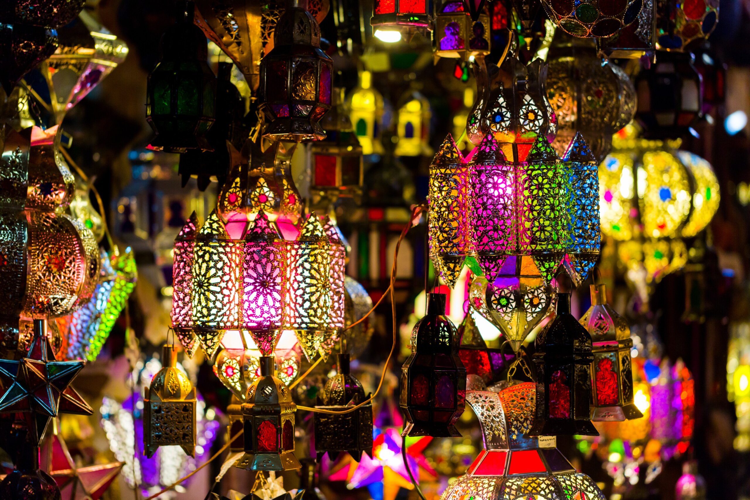 Vibrant colourful handmade tin lamps on medina market
