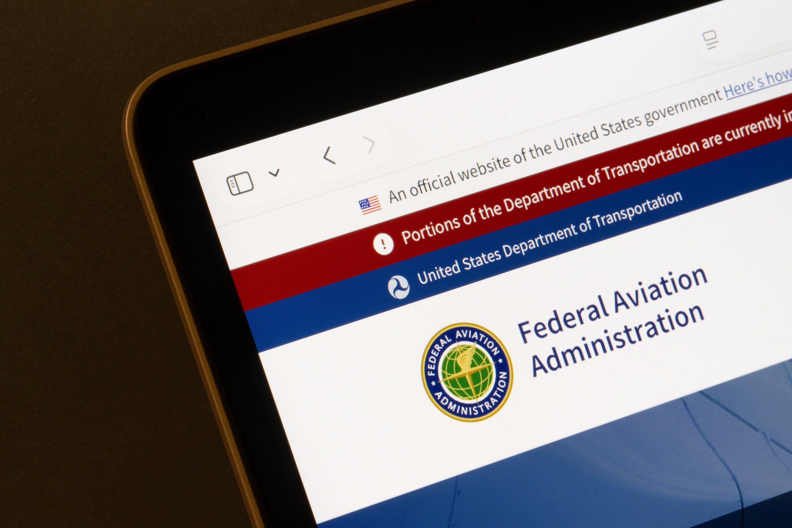 Homepage of the Federal Aviation Administration, a U.S. federal government agency within the U.S. Department of Transportation, is seen on the screen of a computer.