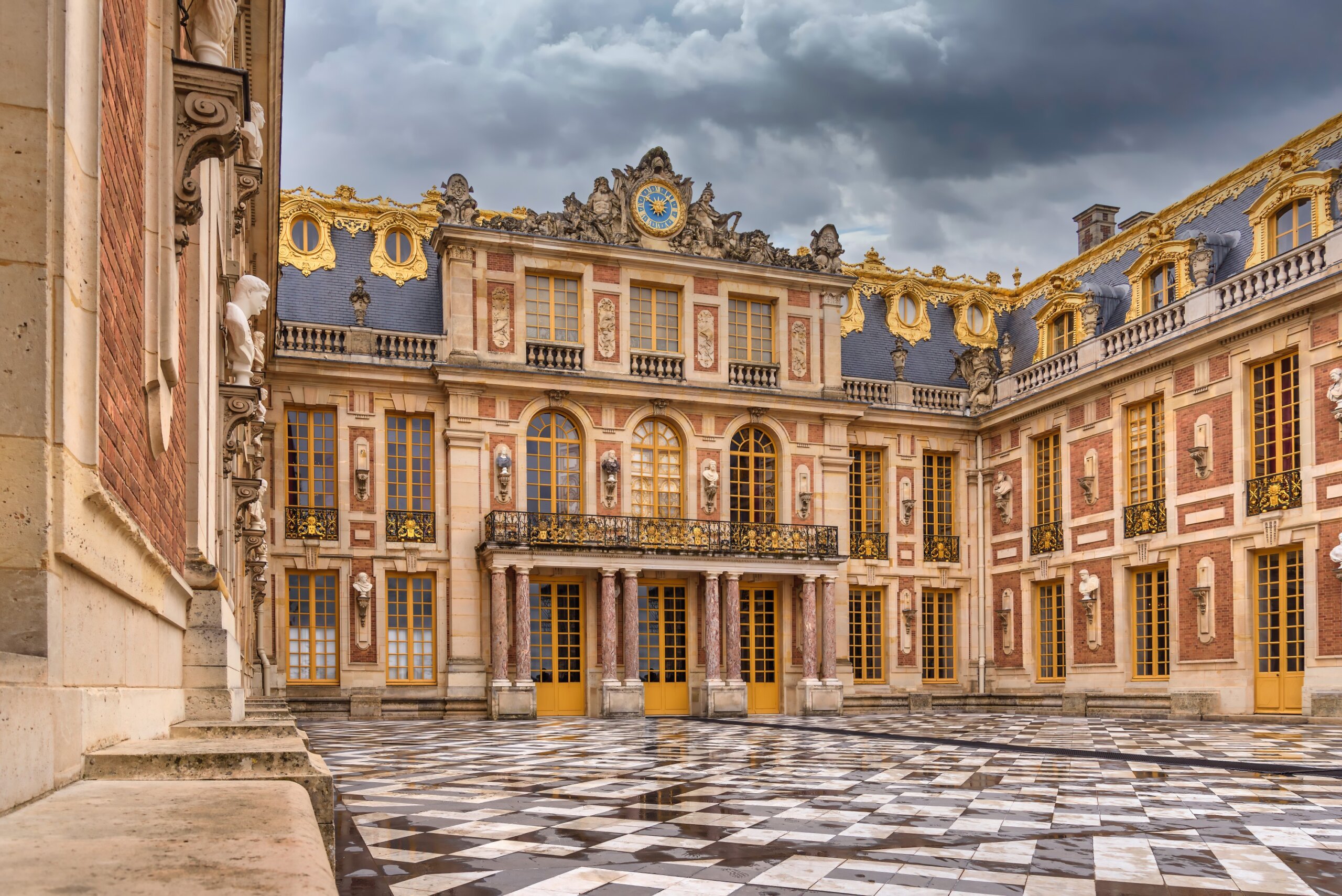 Facade and main entrance of the baroque style Palace of Versailles in France