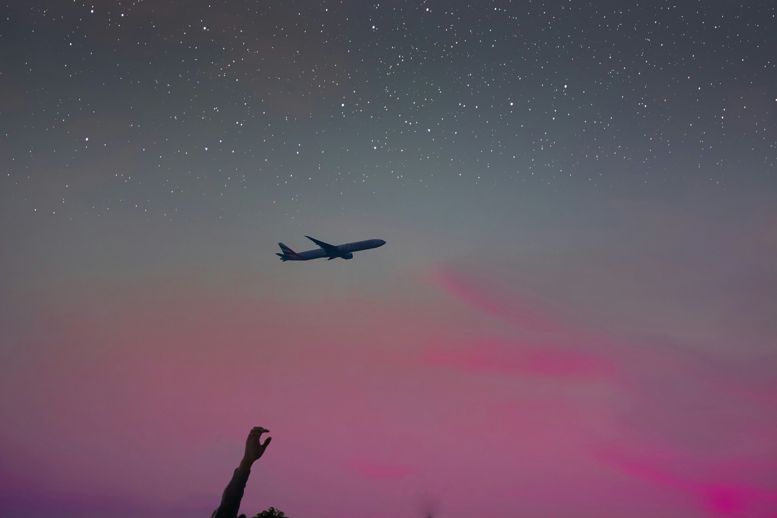 airplane and northern lights
