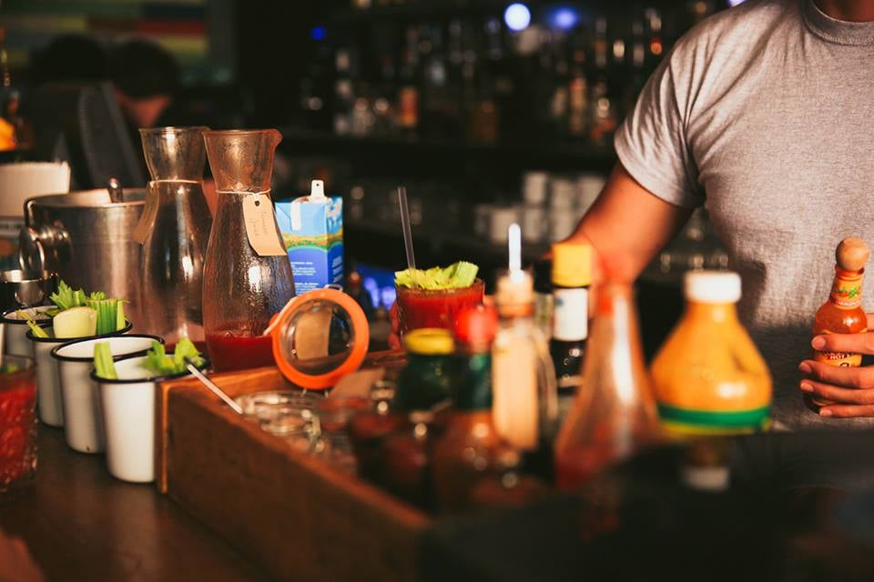 Colorful bar setup at The Rum Kitchen on Portobello Road, one of the relaxed royal family pubs once frequented by Prince Harry.