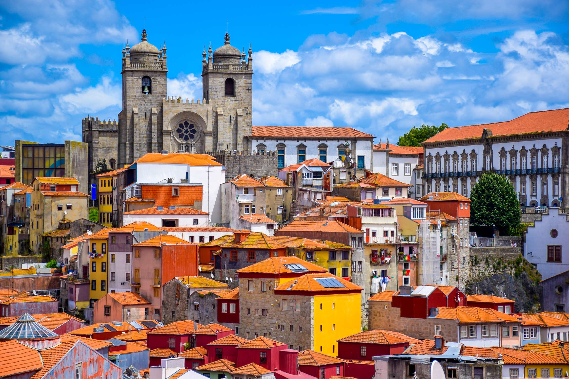 View over the old town of Porto, Portugal with the cathedral and colorful buildings
