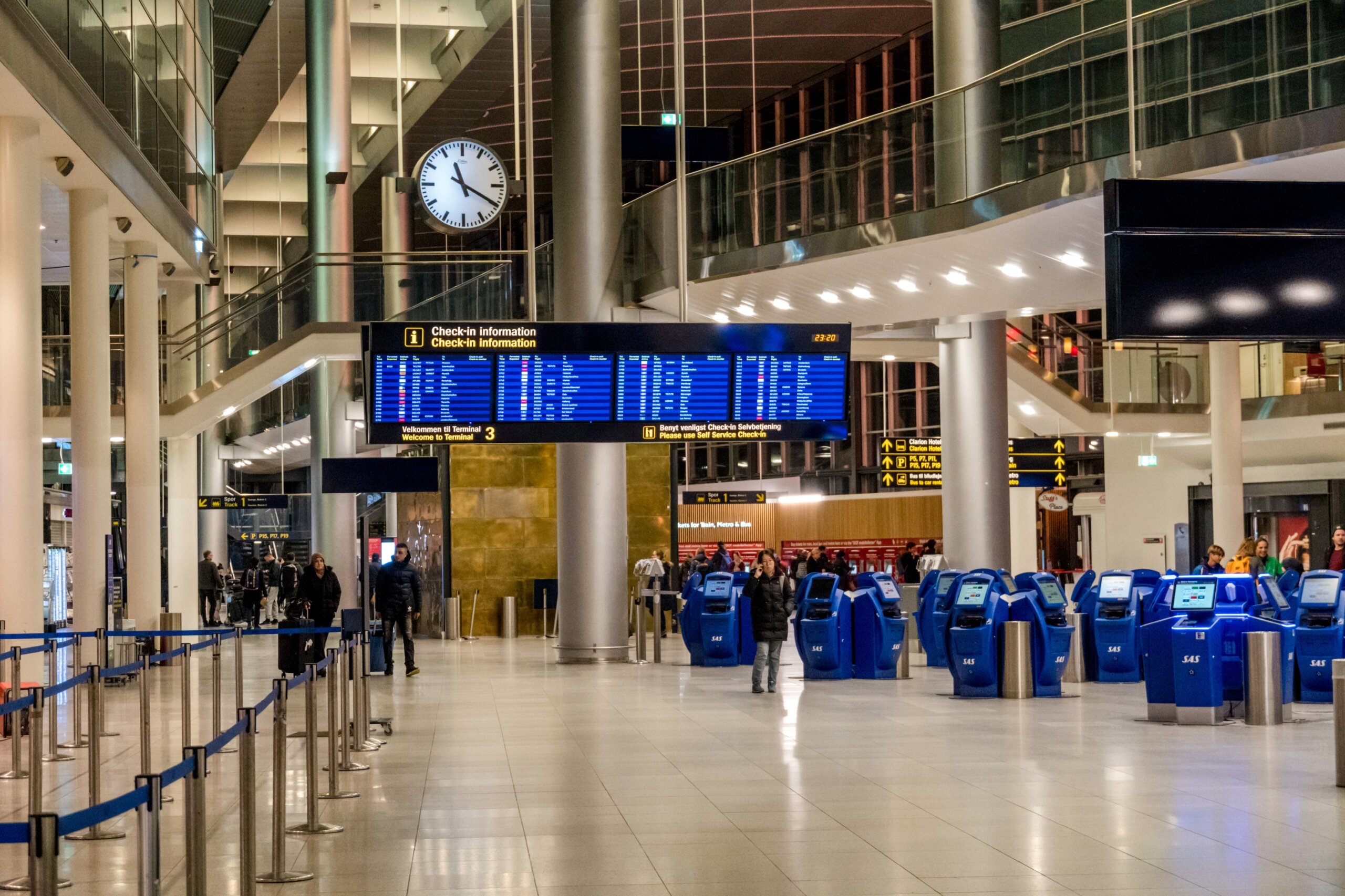 Kastrup Airport in Denmark, Copenhagen. Theme transport and architecture. Evening night empty empty deserted terminal in scandinavian european airport inside the airport station