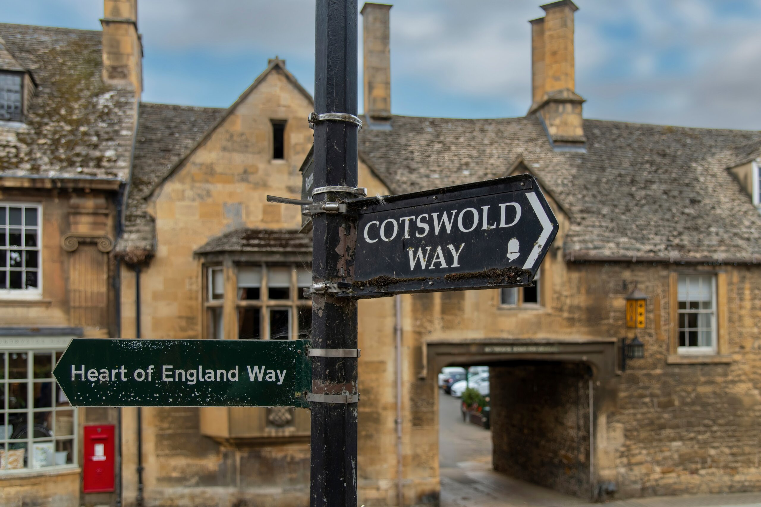 Cotswold Way trail sign in a traditional English village