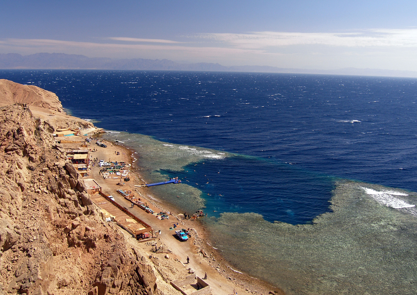 Blue Hole is a popular diving location on east Sinai, a few kilometres north of Dahab, Egypt on the coast of the Red Sea.