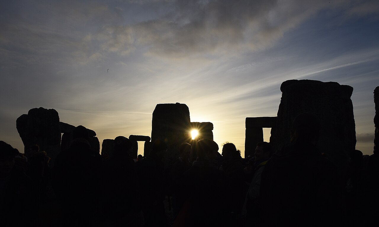 The sun rises following the winter solstice at Stonehenge, England, Dec. 22, 2018. Each year, thousands of people visit to celebrate the summer and winter solstices in and around the stone circle. (U.S.
