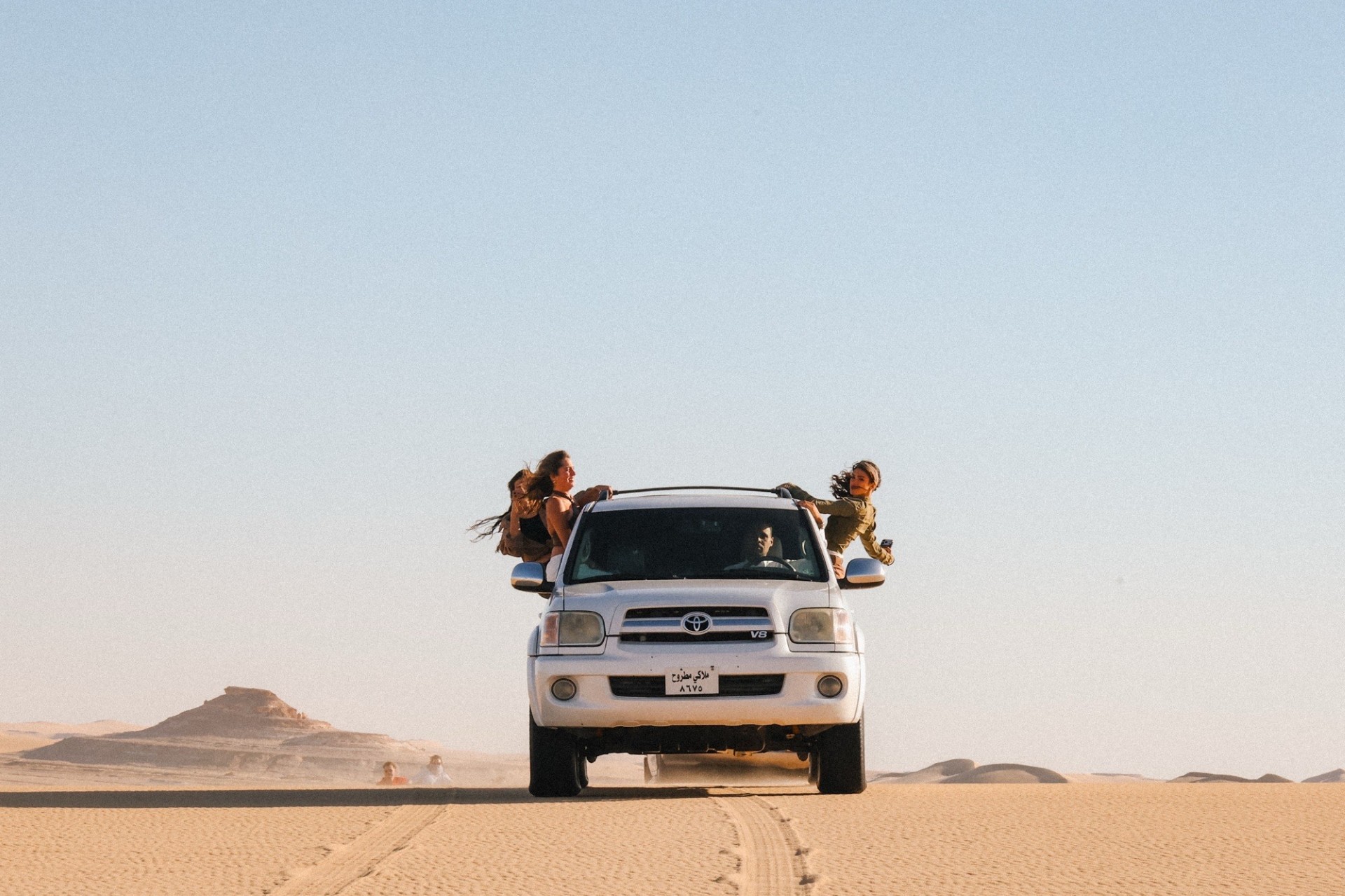 4x4 driving through sand dunes on a Siwa Egypt desert tour in Siwa Oasis