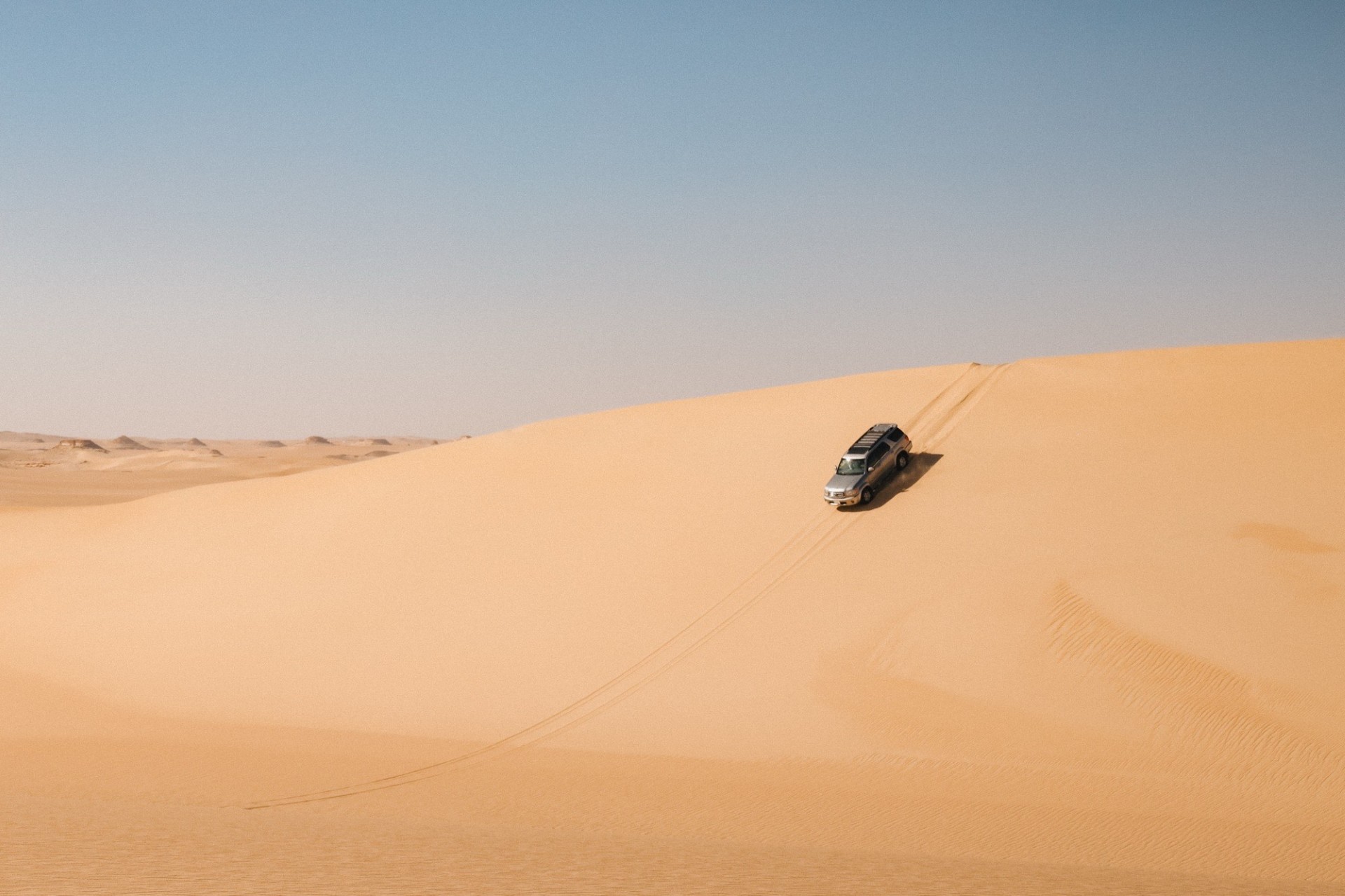Driving through the middle of the sand dunes in the desert in Siwa.
