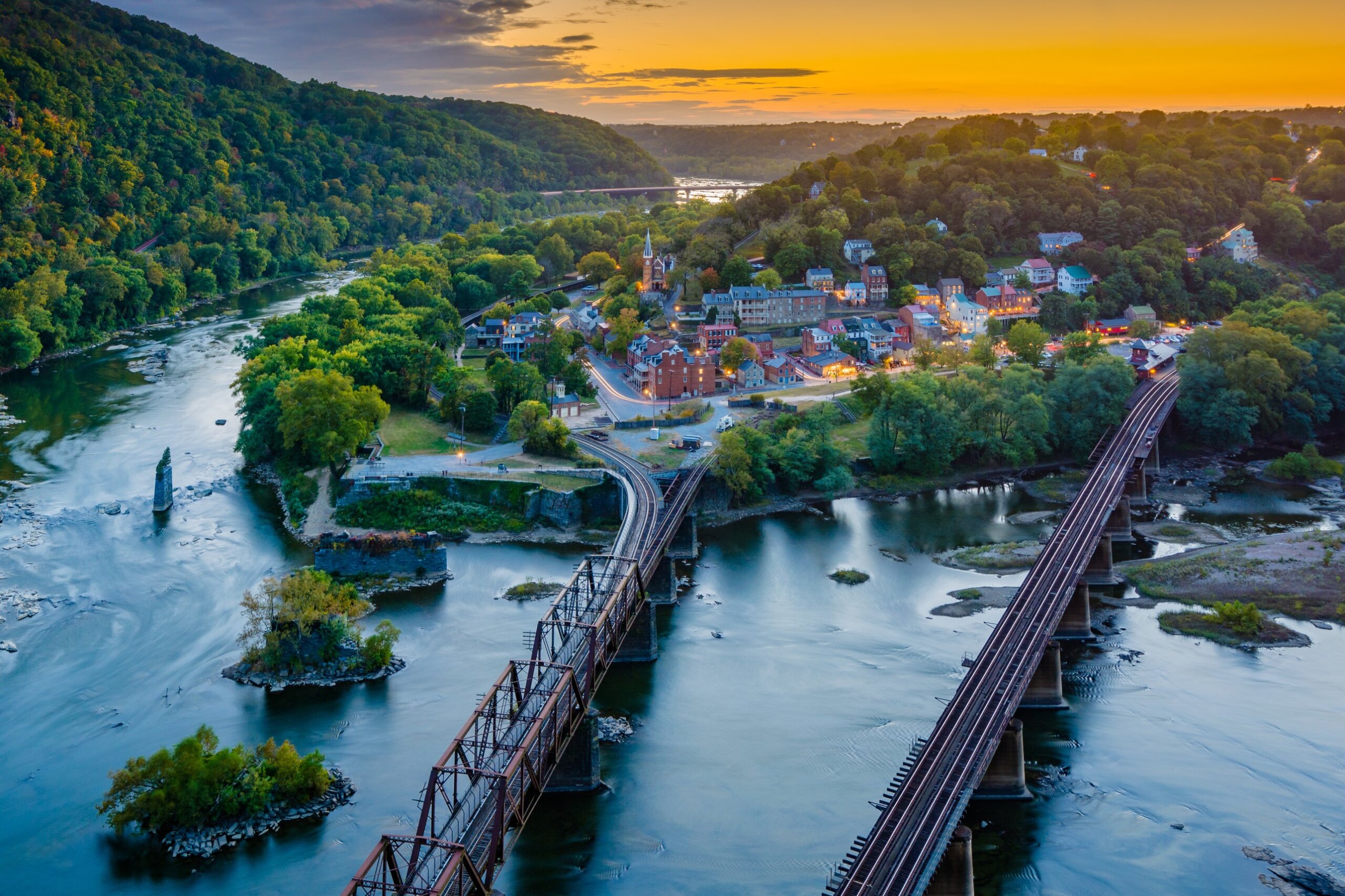 Sunset aerial view of an Appalachian river town representing beautiful towns in Appalachia