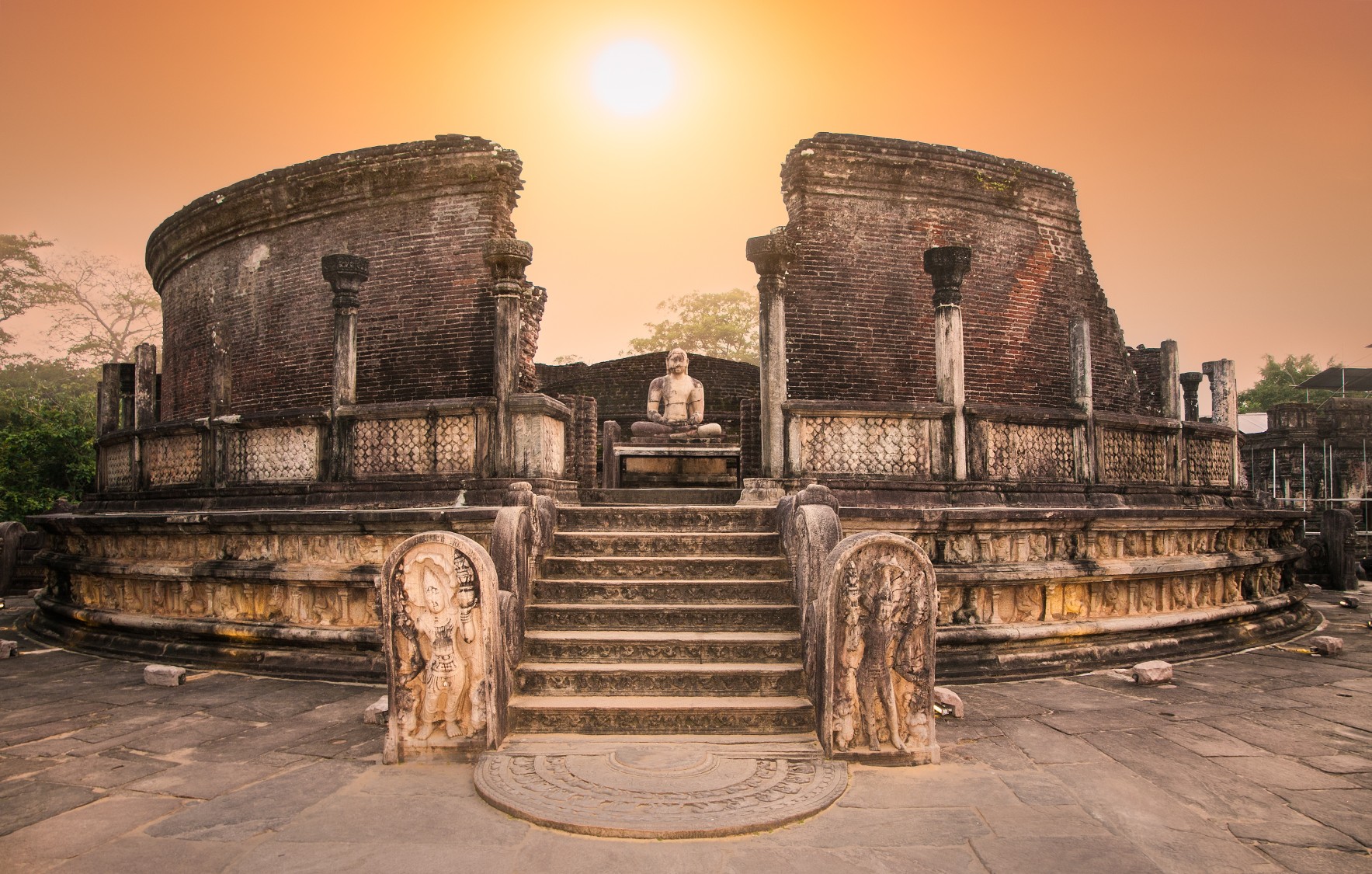 Ancient stone ruins with steps at sunrise in a historic site