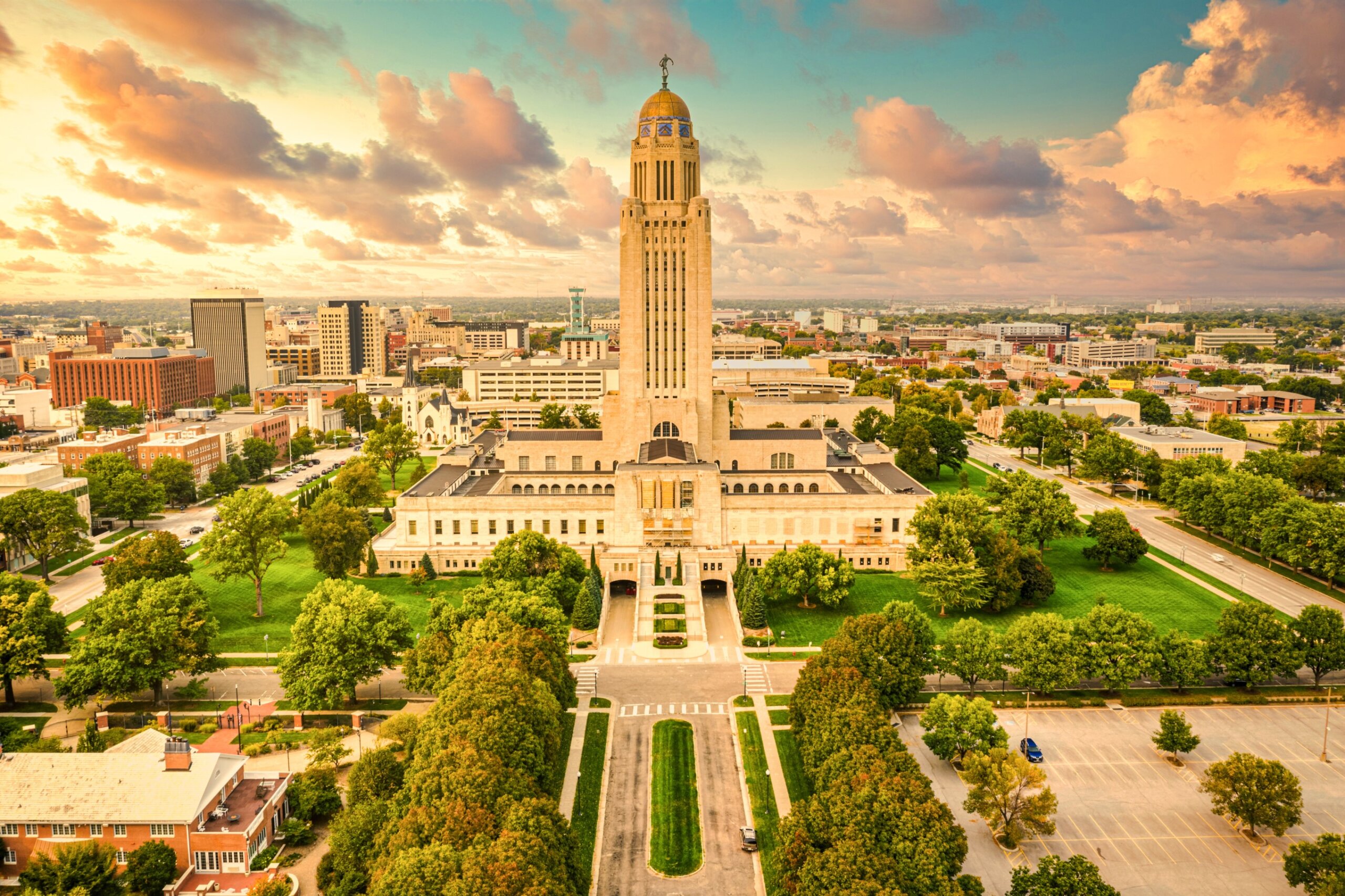 Lincoln skyline and Nebraska State Capitol. The Nebraska State Capitol is the seat of government for the U.S. state of Nebraska and is located in downtown Lincoln. 