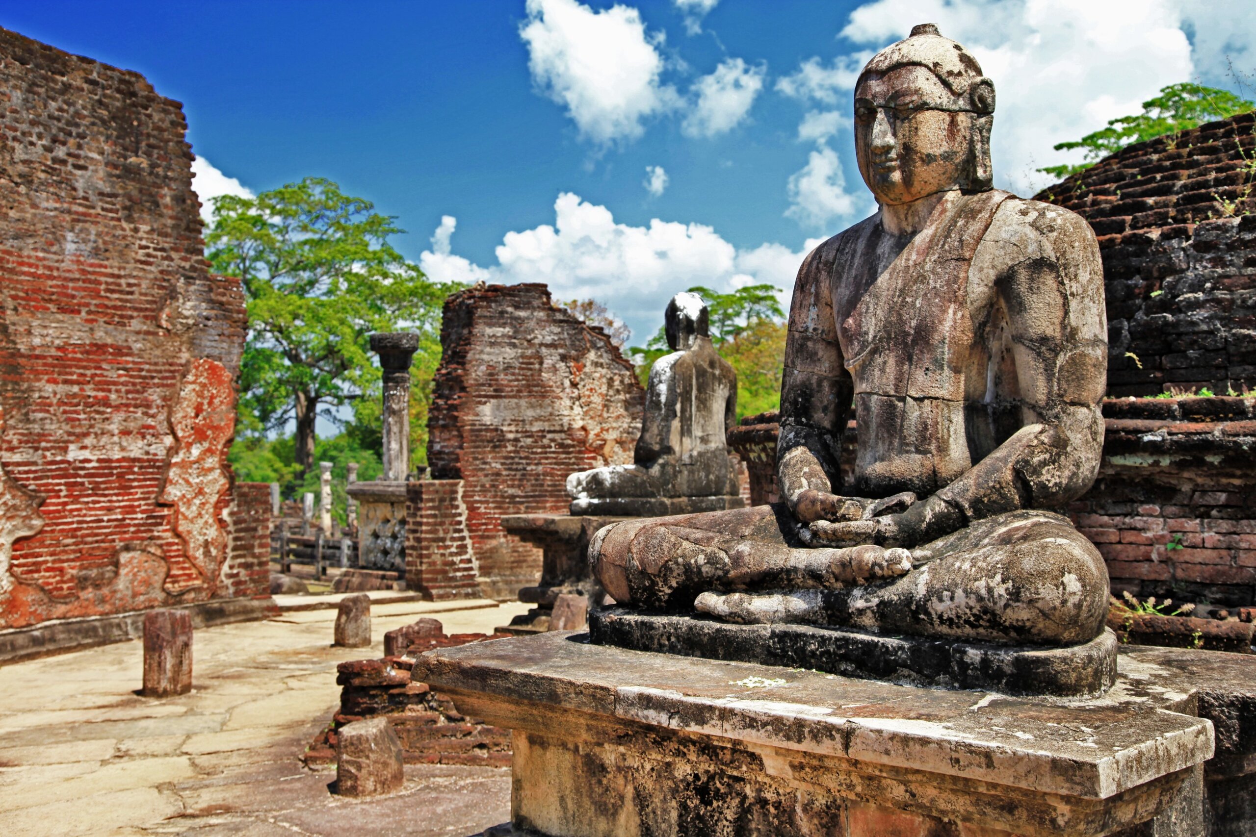 Ancient Sitting Buddha Statue on Pedestal: Sacred Quadrangle of Polonnaruwa. Historic Ruins of Medieval Capital, UNESCO Heritage Site, Sri Lanka.