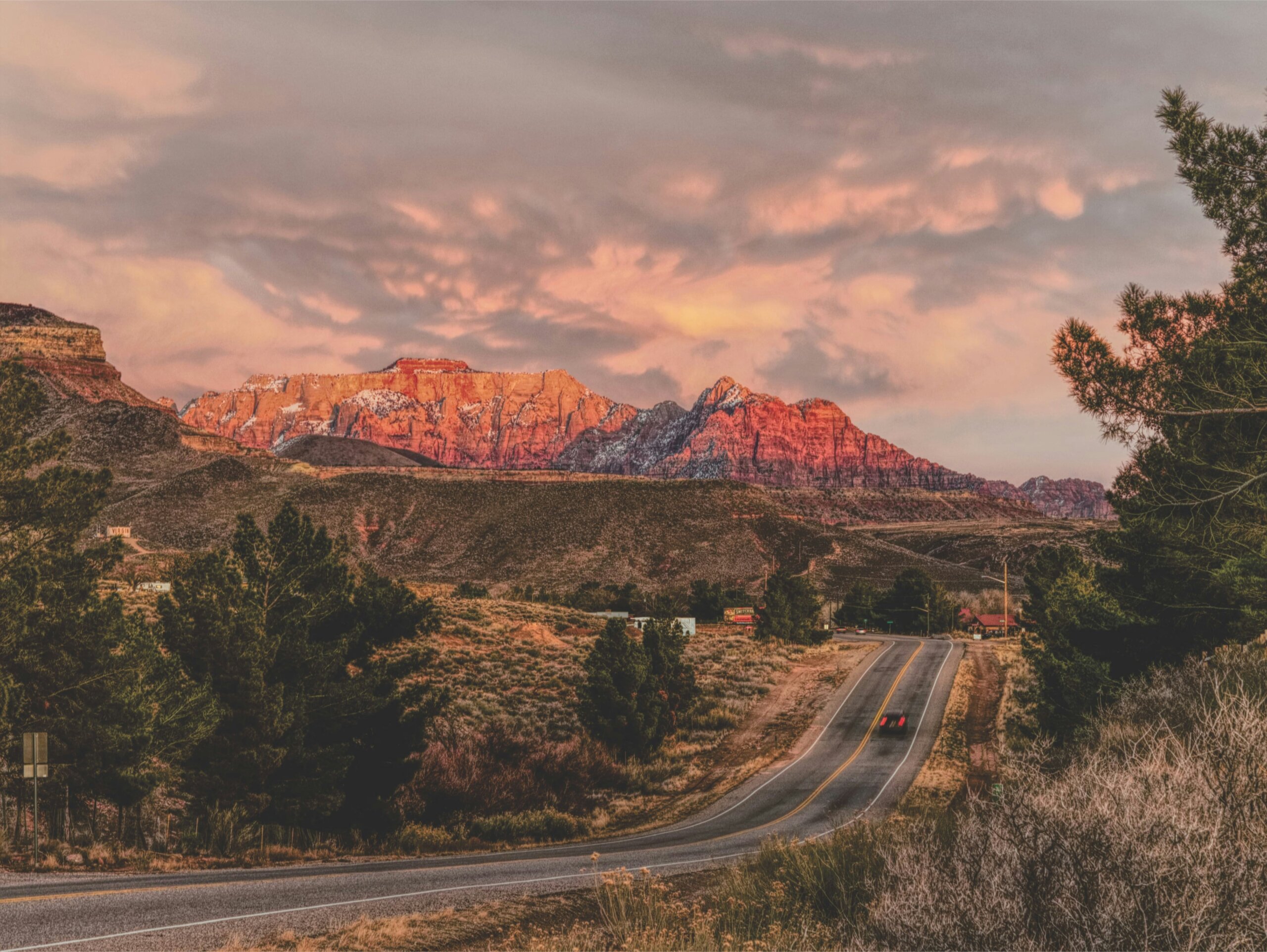 zion national park - Scenic road and red rock cliffs near an American national park at sunset