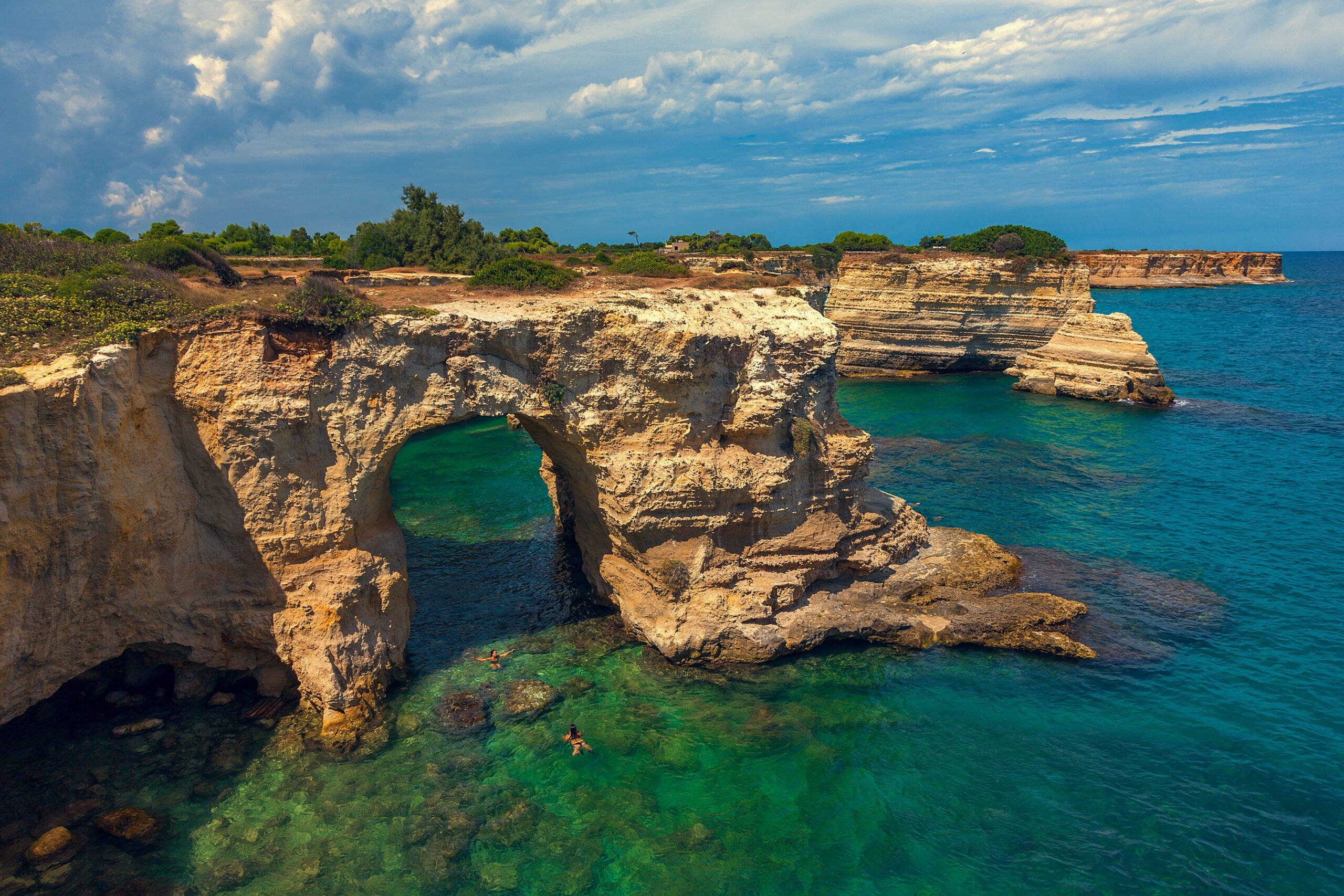 Faraglioni di Sant'Andrea natural stone arch on Salento coast before the Lovers' Arch collapse