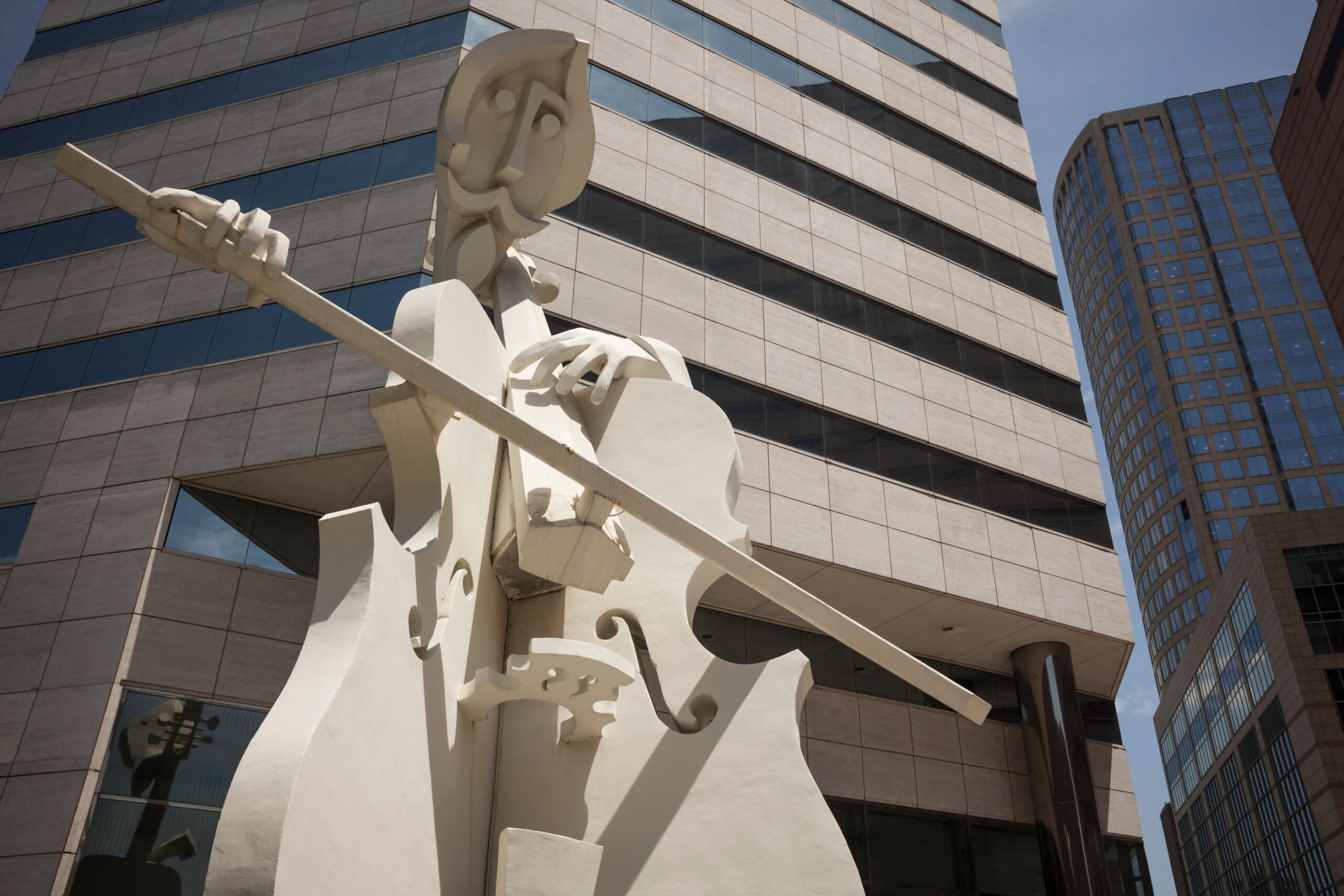 Giant Cellist, a David Adickes street sculpture in Theater District, Houston Downtown
