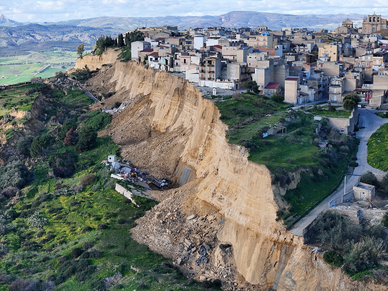 Aerial photo of the landslide front (Ss. Croci area) dated January 27, 2026, at 3:12 PM