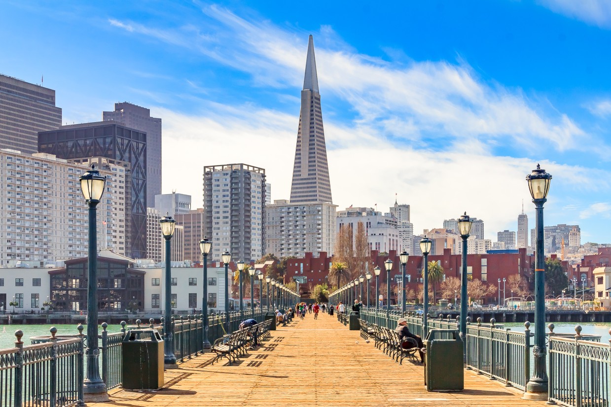 Downton San Francisco and the Transamerica Pyramid from wooden Pier 7 on a foggy day 
