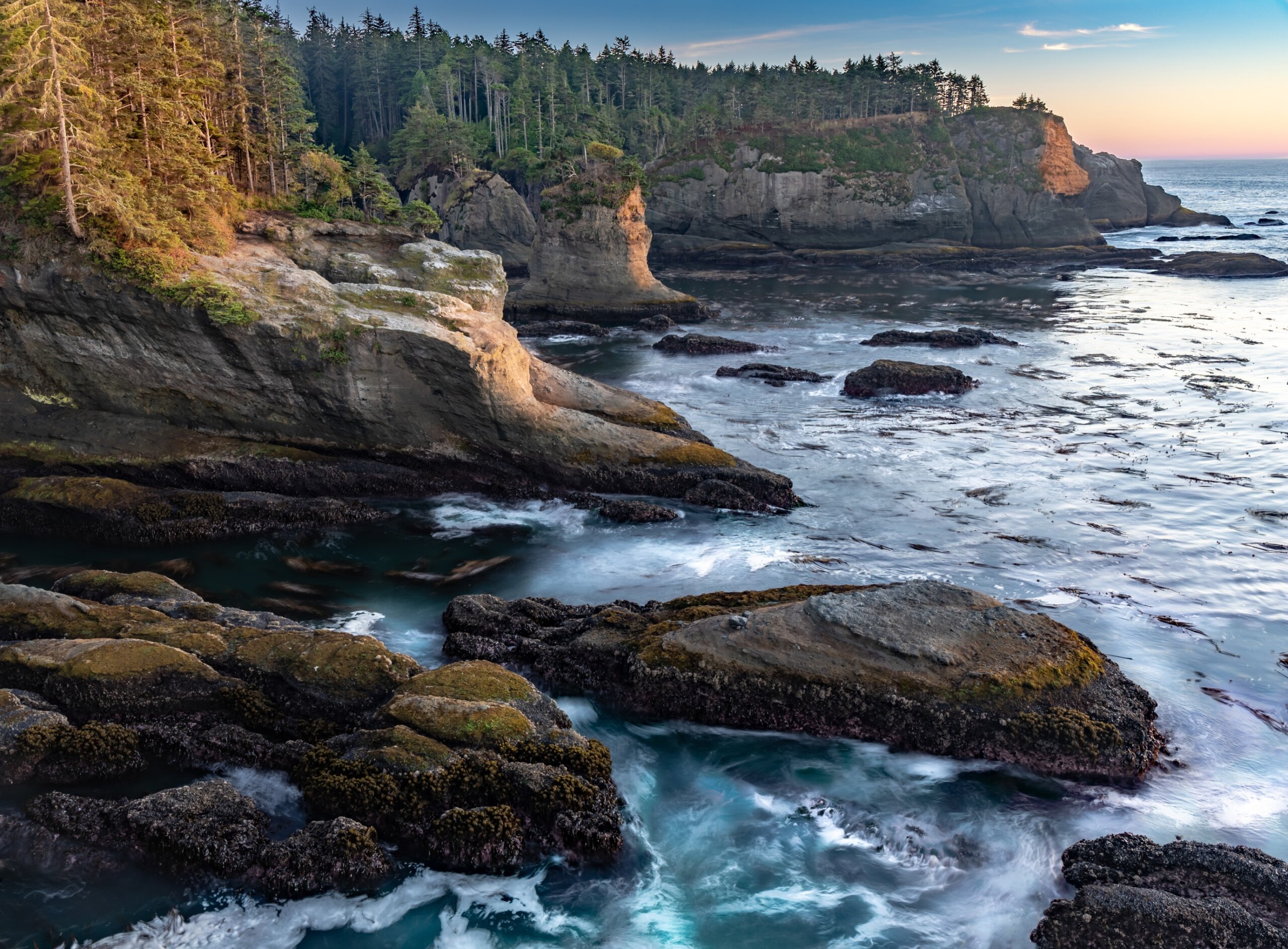 Cape Flattery is the northwesternmost point of the contiguous United States. It is in Clallam County, WA on the Olympic Peninsula, where the Strait of Juan de Fuca joins the Pacific oceam.