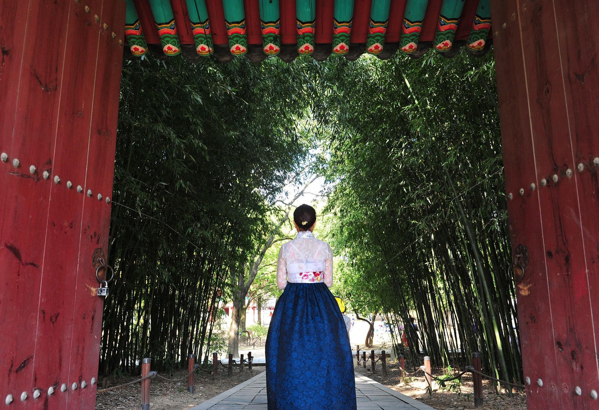 Korean women dressed in hanbok and touring the Gyeonggijeon at Korean traditional house Village in Jeonju, Jeollabuk-do, South Korea.
