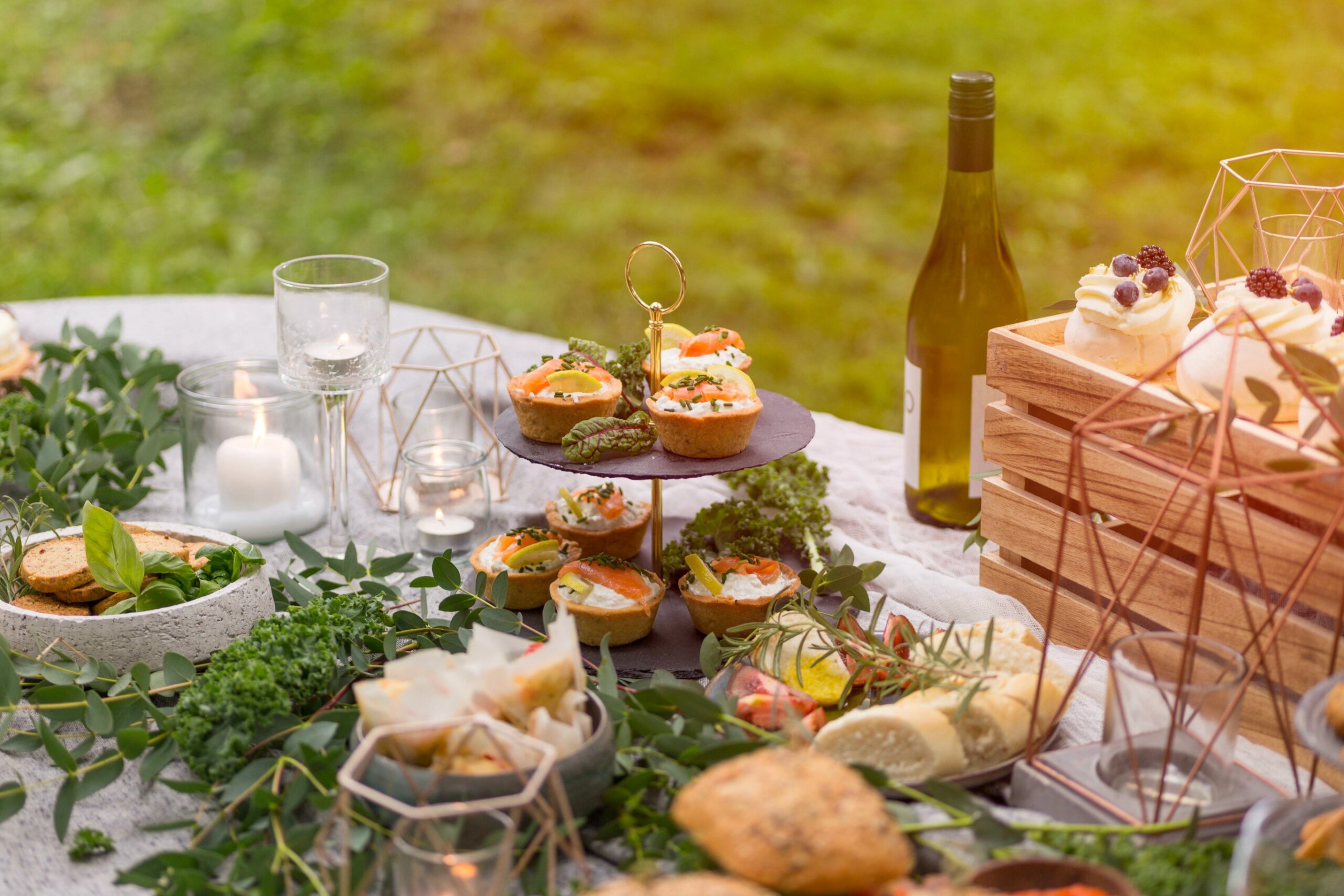 Farm-to-table outdoor dining with fresh local food and wine on a rustic table