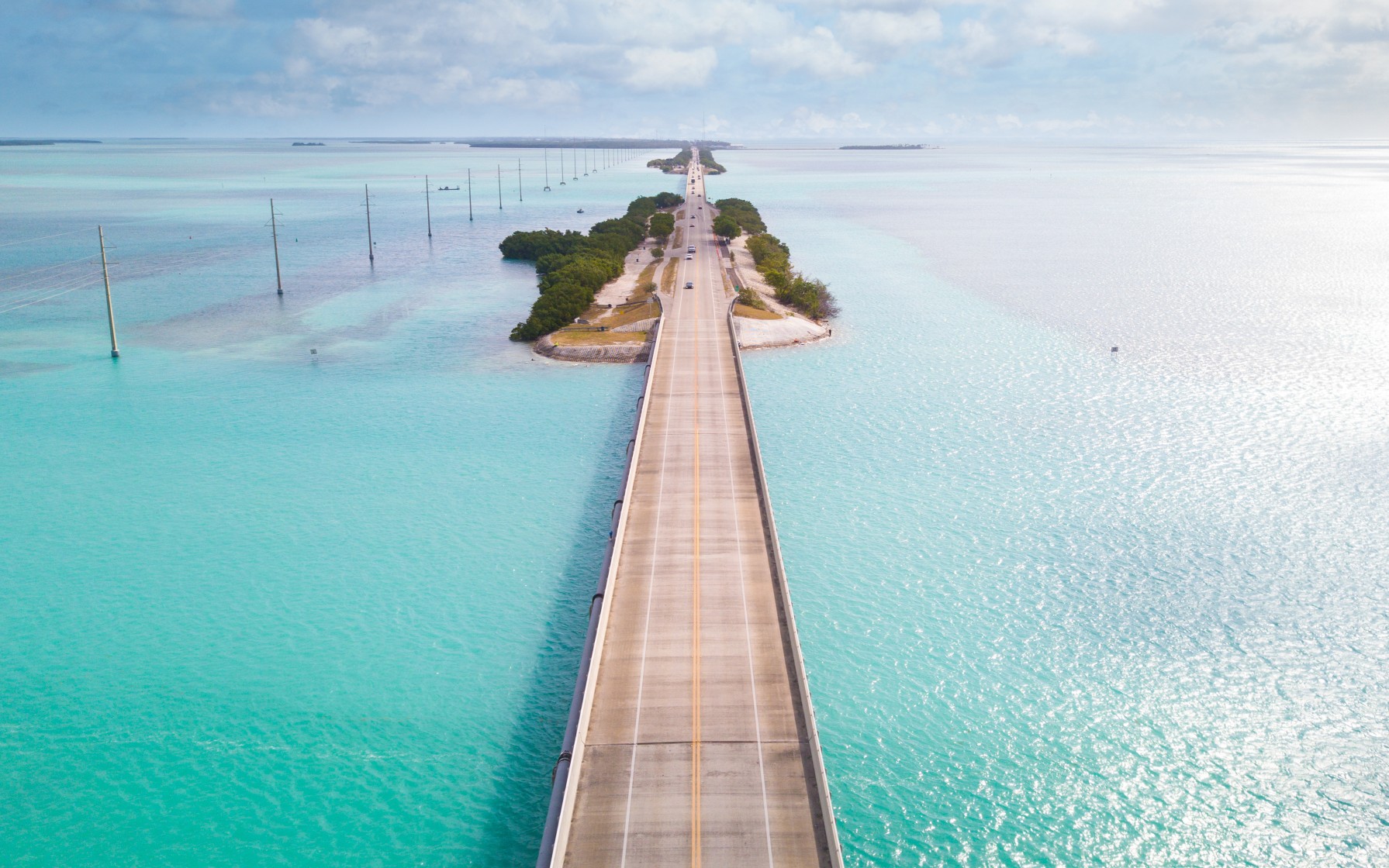 Florida Keys. Bridge or road on Key West FL. Atlantic ocean and Gulf of Mexico. Spring break or Summer vacations in Florida. Tropical nature. Tropical nature. Aerial view.
