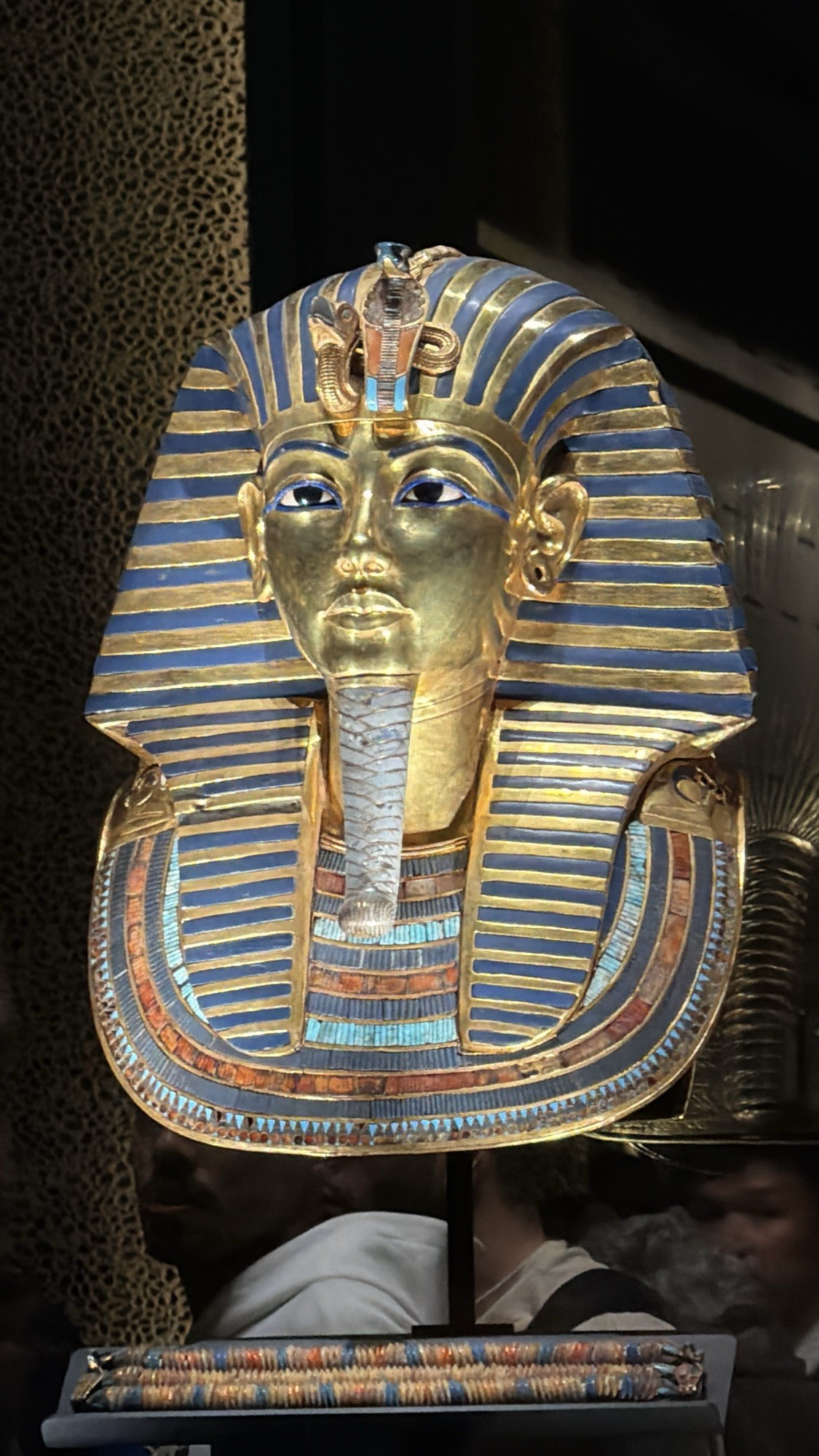 King Tuts golden face mask on display in the Grand Egyptian Museum.
