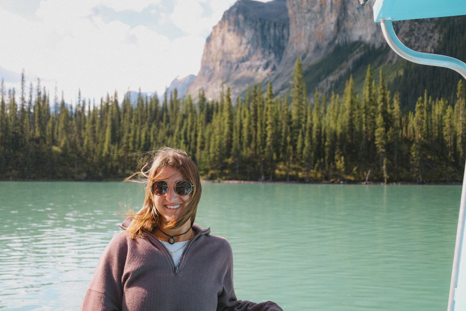 digital nomad traveler by mountain lake during full-time travel