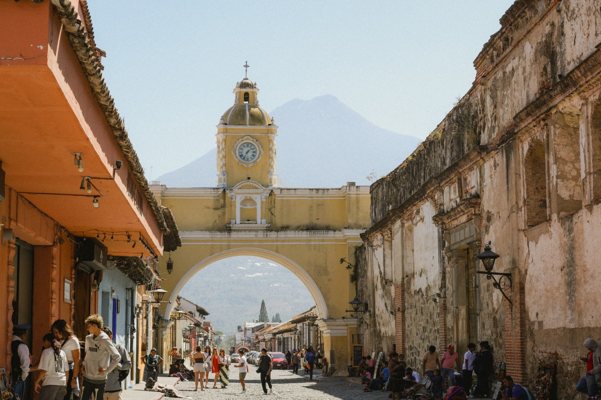 Santa Catalina Arch in Antigua Guatemala with volcano in the background
