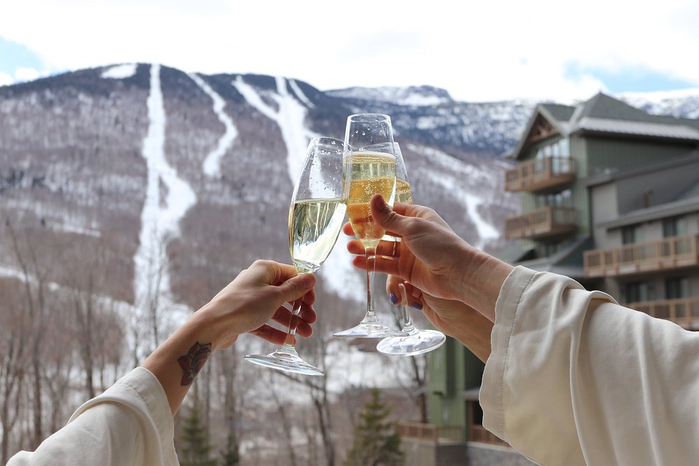travelers relaxing at a mountain spa resort after hiking in a scenic U.S. destination