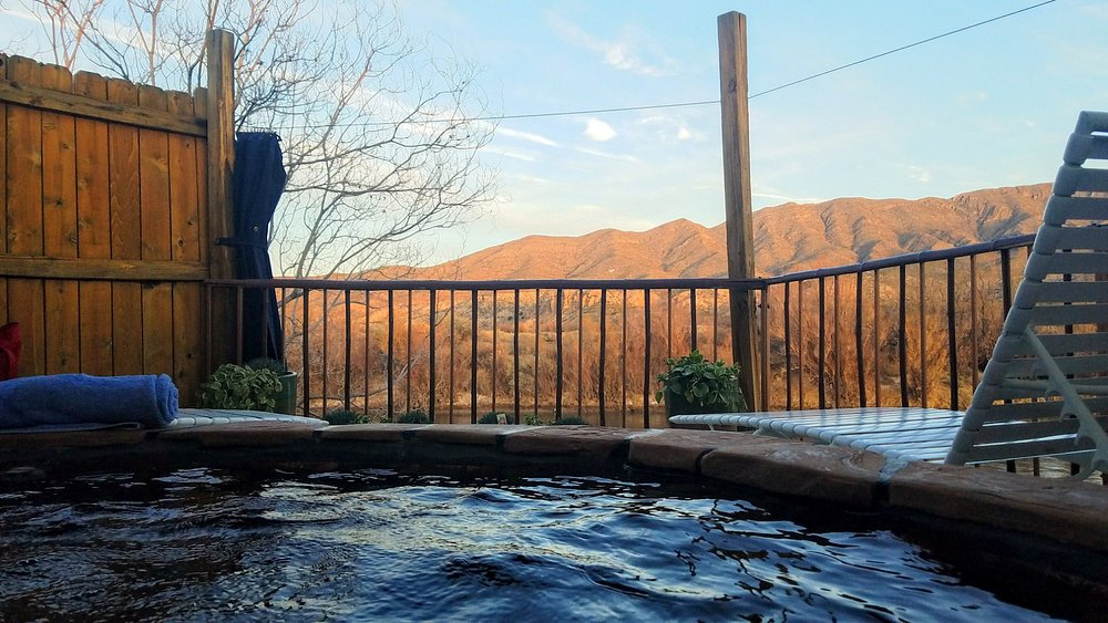 private outdoor hot springs soak with mountain view in an underrated U.S. spa town