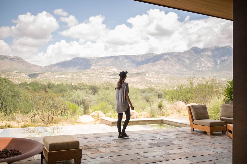 traveler at desert wellness retreat with mountain view in the U.S.