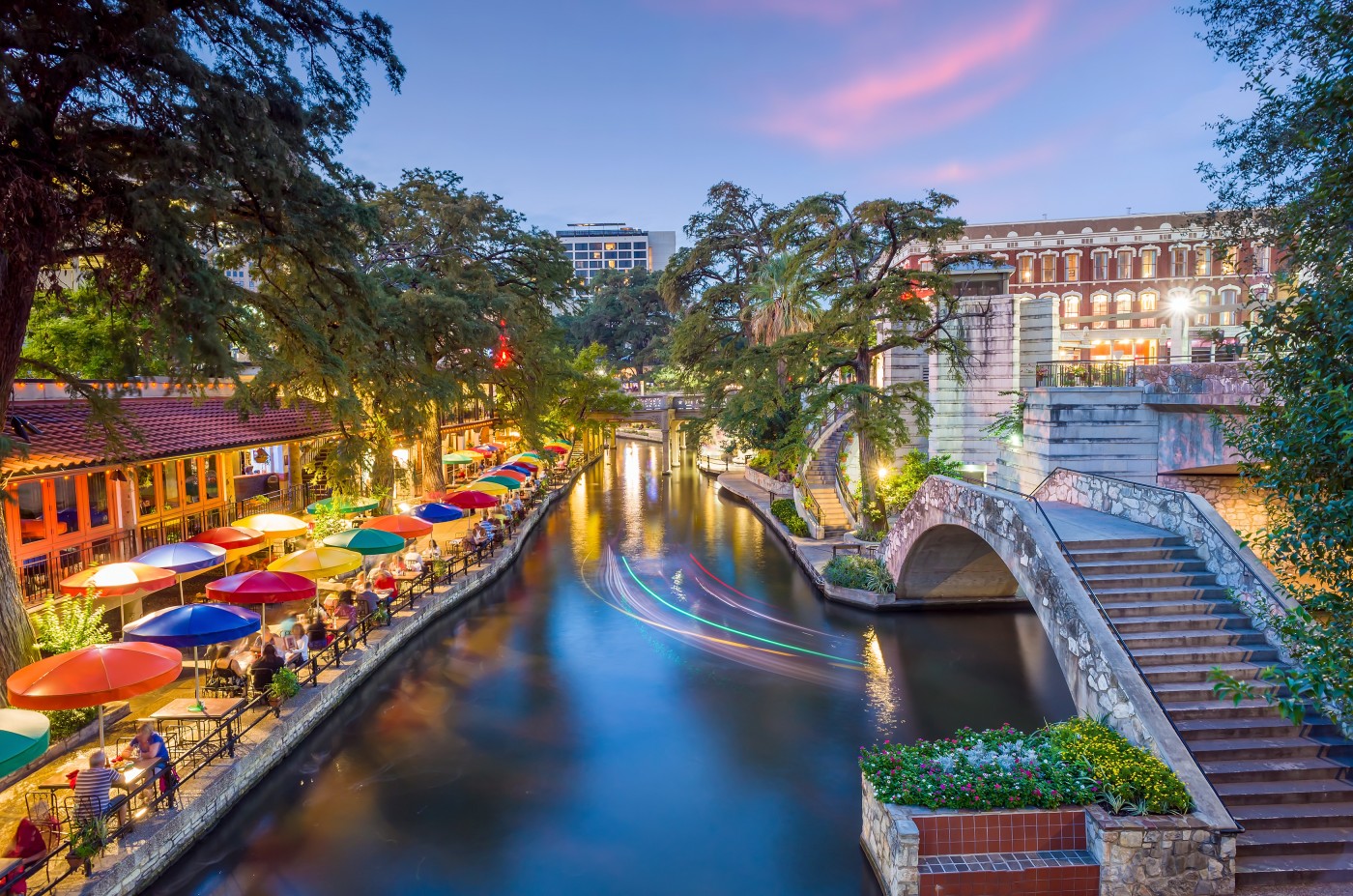 River walk in San Antonio city downtown skyline cityscape of Texas USA
