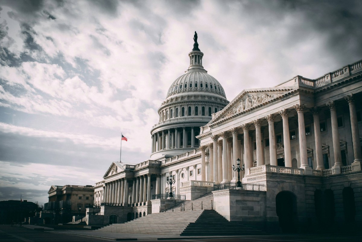 United States Capitol building in Washington DC under cloudy sky representing national policy and safety discussions
