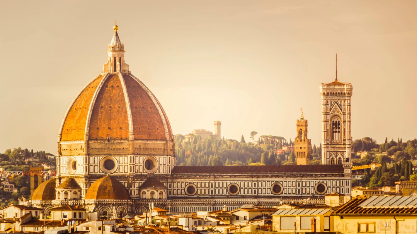 Florence Cathedral dome and Giotto's Campanile at golden hour, Florence, Italy