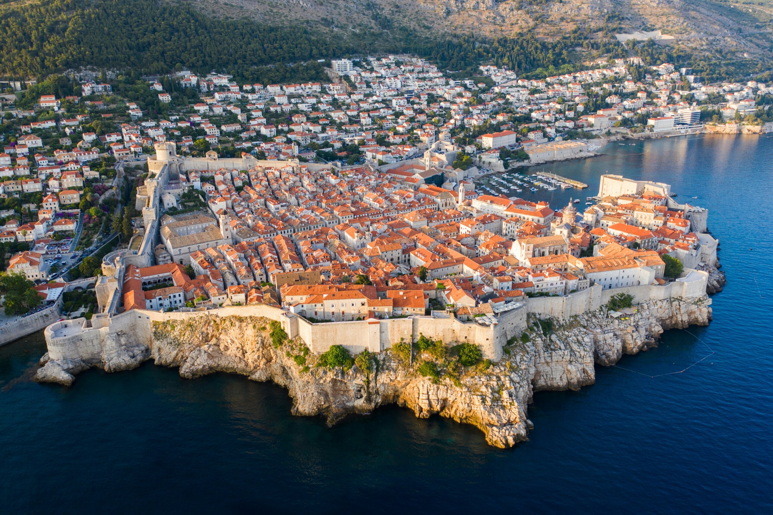 aerial view of Dubrovnik Old Town in Croatia with stone walls and Adriatic coastline