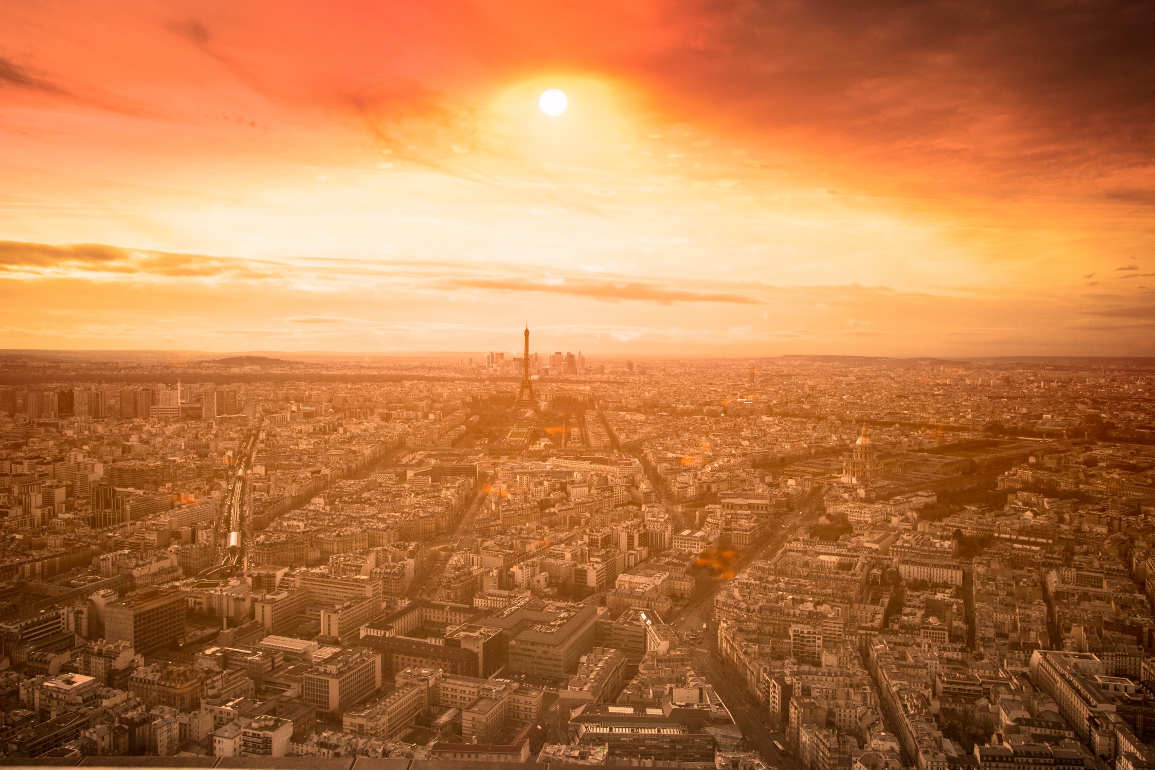 Heat wave in France. Eiffel tower in orange.