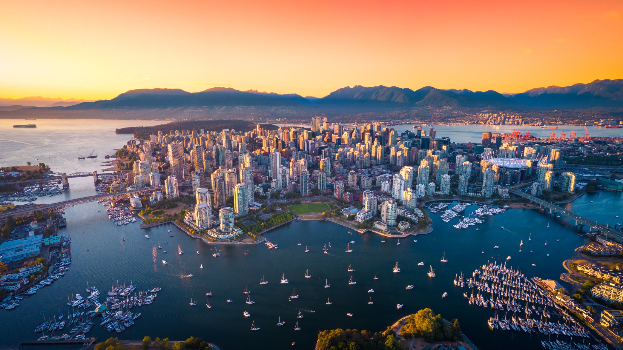 Beautiful aerial view of downtown Vancouver skyline, British Columbia, Canada at sunset
