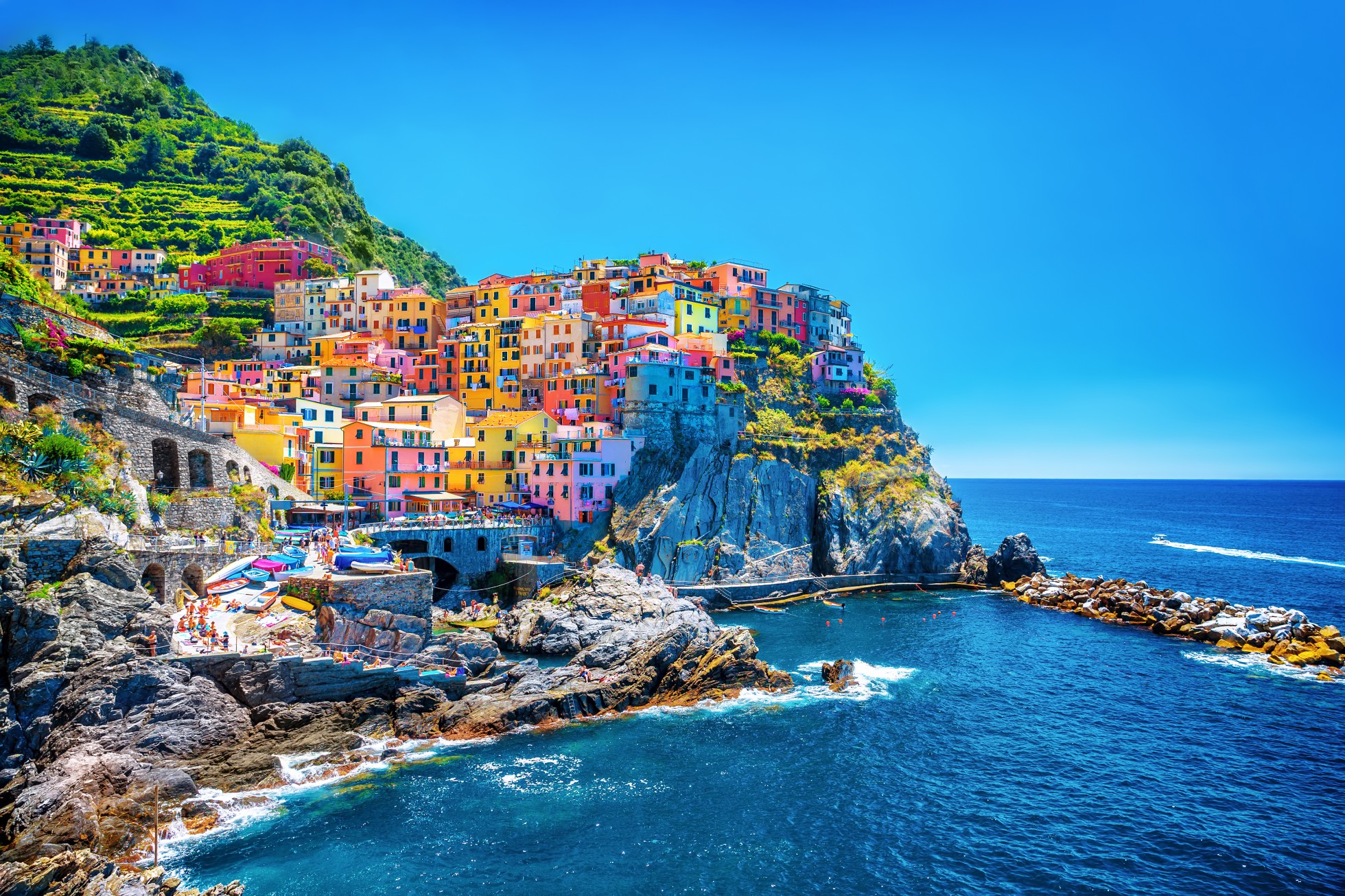 Colorful European coastal village overlooking Mediterranean Sea during summer