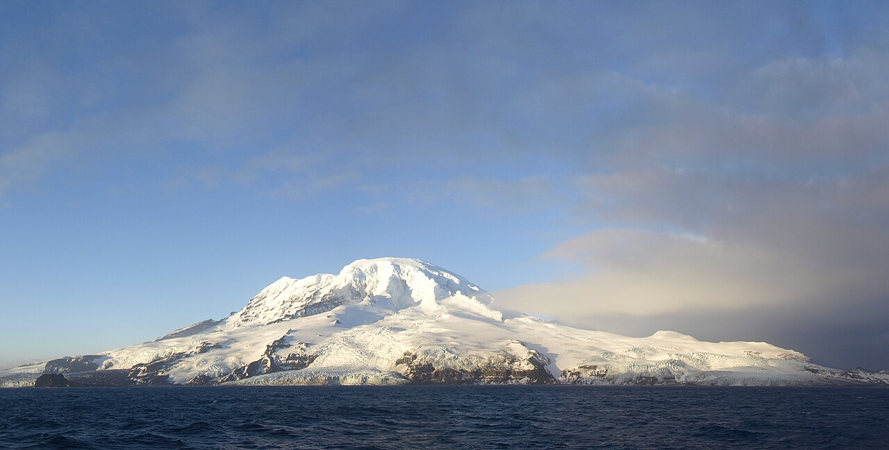 Heard Island from a boat facing southwest from approximately the Shag Islets.