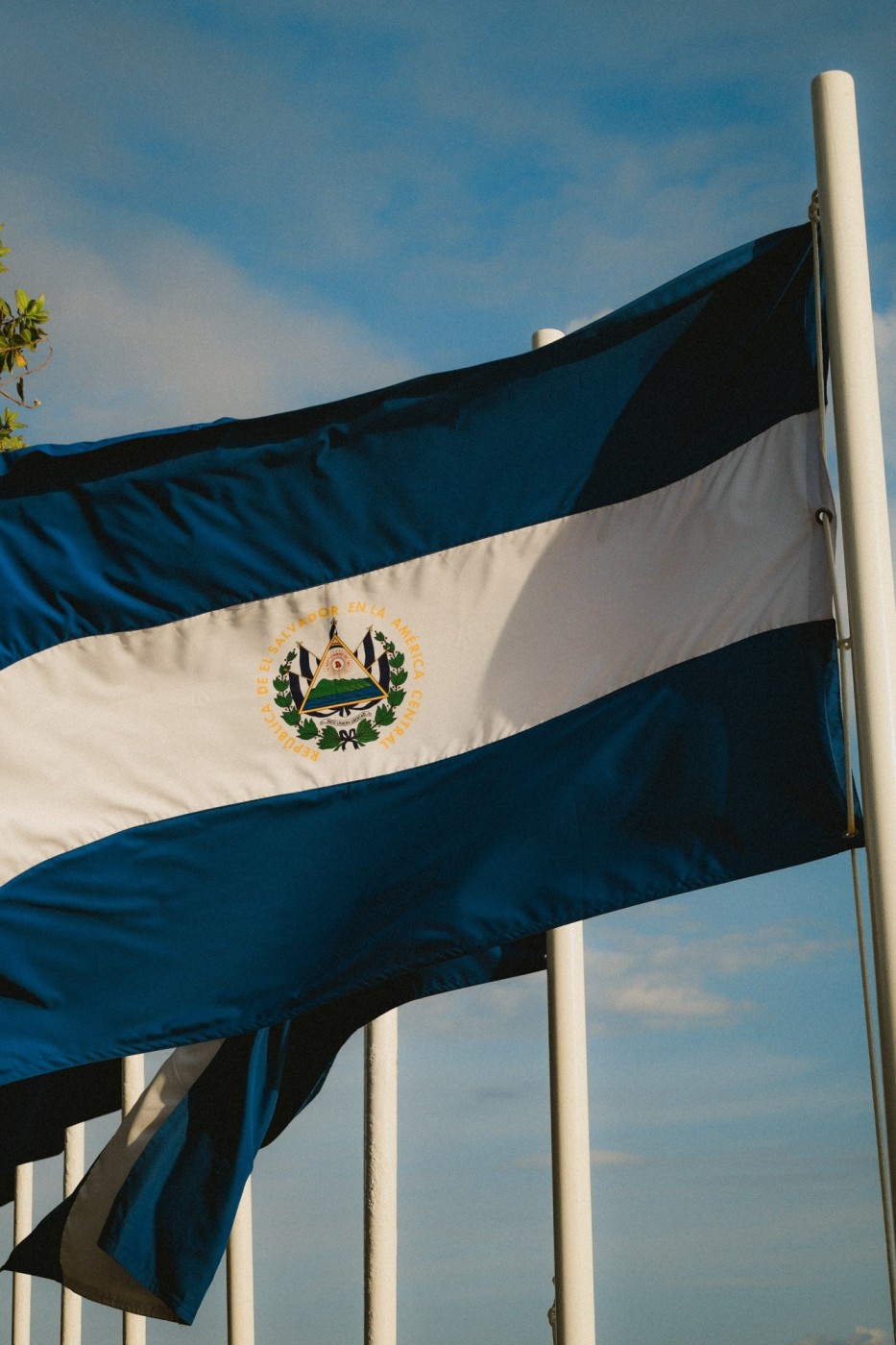 The national flag of El Salvador seen along the coastline of El Tunco.
