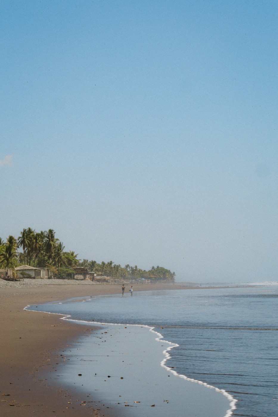 Black sand beach located 10 minutes east of El Tunco.
