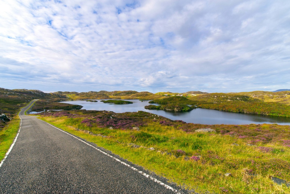 Scenic road and coastal landscape in the Outer Hebrides of Scotland