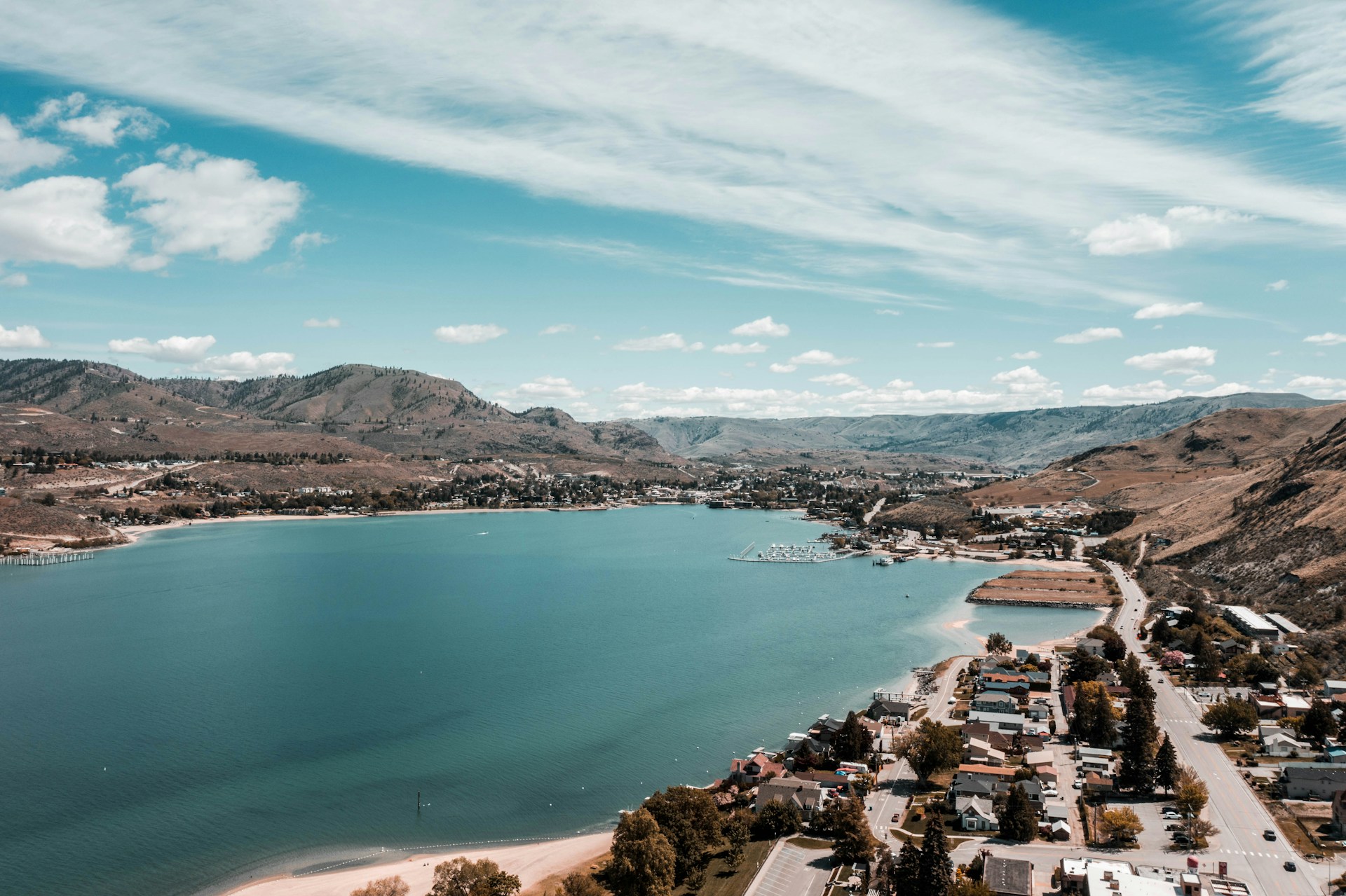 Scenic U.S. lake town surrounded by mountains and blue water