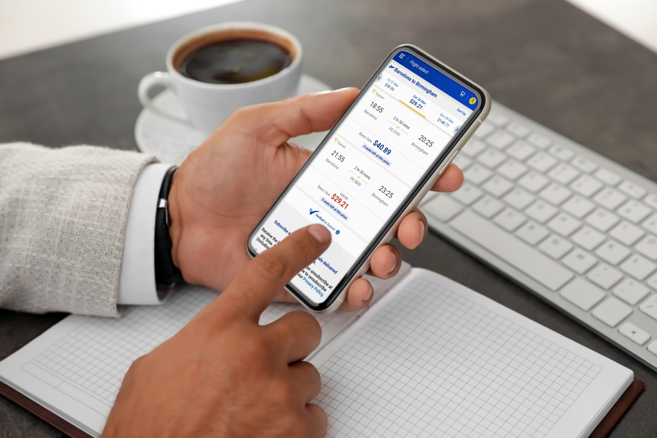 Person booking flight on smartphone airline application
